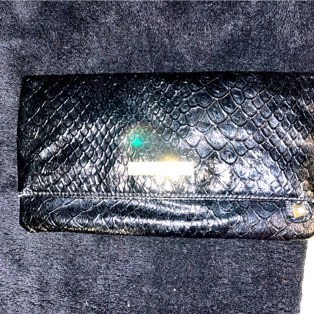 Women’s BCBG black reptilian clutch